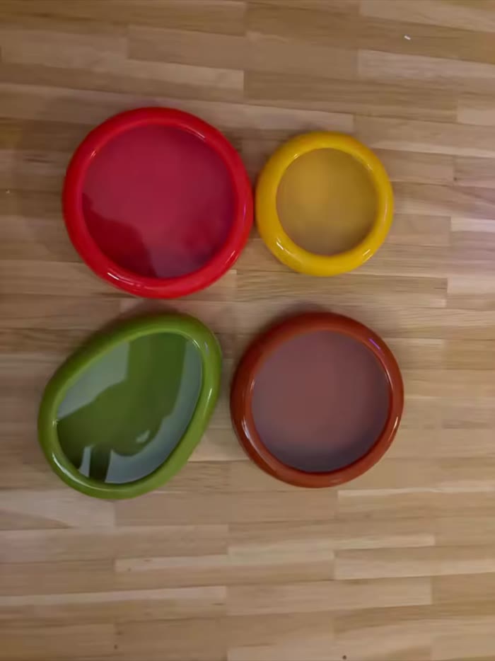 Four pods on a wooden floor